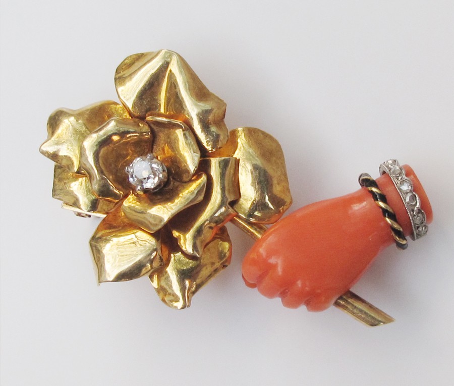 hand and rose brooch