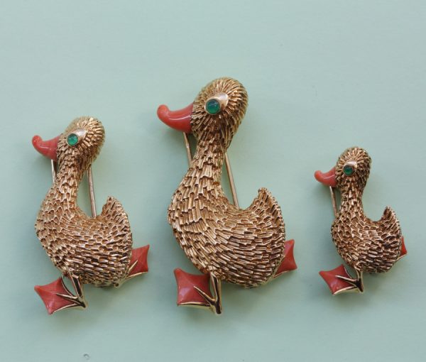 three duck brooches