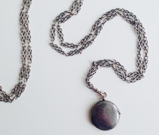 silver chain and locket