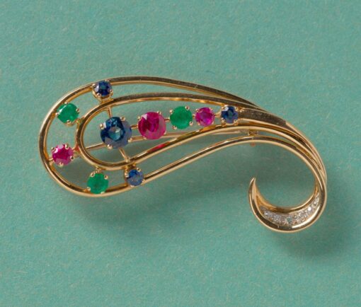 gold and gemset wire work brooch
