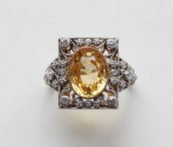 Arts & Crafts' ring with a yellow sapphire