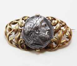 gold and silver coin brooch