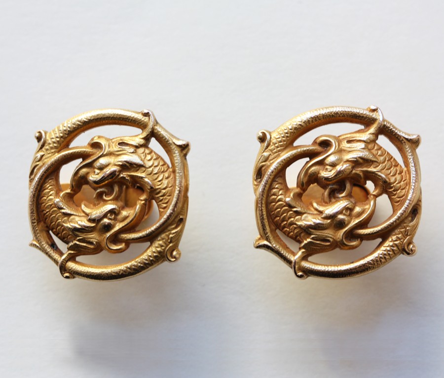 gold cufflinks with sea creatures