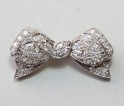platinum and diamond bow brooch