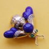 gold and lapis bee brooch