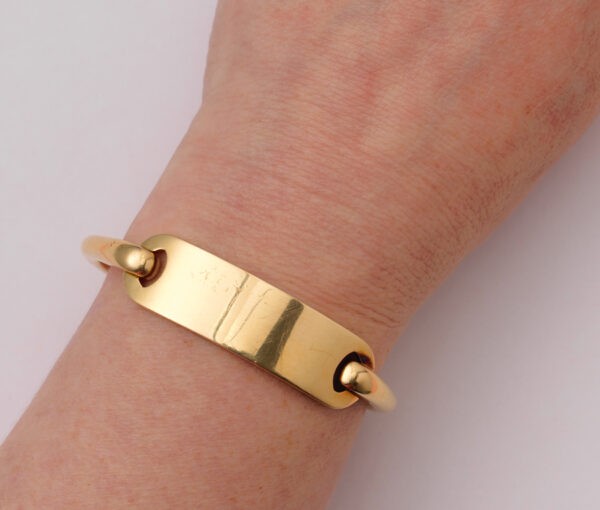gold tag bracelet