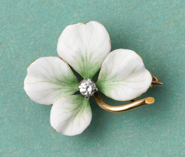 white flower brooch
