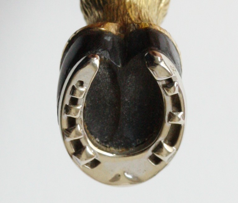 hermes horse leg pendant