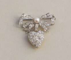 bow and heart brooch