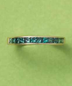 gold ring with blue diamonds