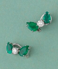 white gold earclips with diamond and emerald