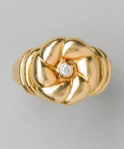 gold flower ring with a diamond heart