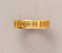 gold and yellow sapphire eternity band by hemmerle