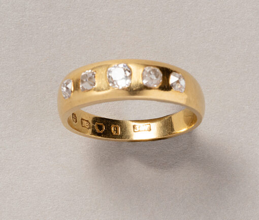 gold and diamond band ring