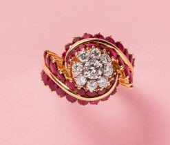 an 18 carat gold French dress ring with diamonds and rubies