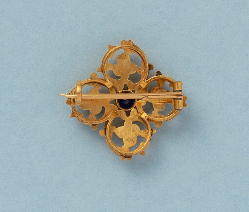 gold brooch with pearls and sapphire