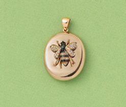 gold enamel and diamond bee locket