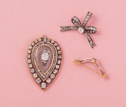 diamond and gold heart brooch and pendant