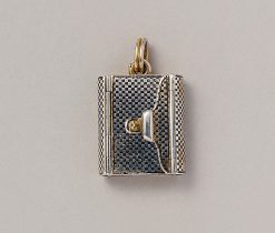 A silver gilt and niello locket in the shape of an envelope or book, with four compartments, England, circa 1900. dimensions: 3.2 x 2.2 cm weight: 16.68 grams