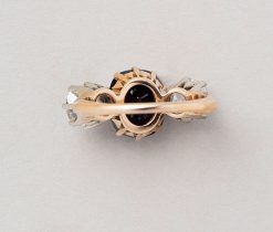 gold diamond and sapphire three stone ring