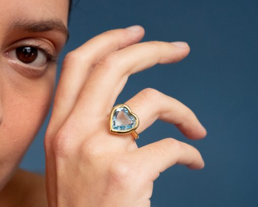 gold and blue topaz heart ring by Adler