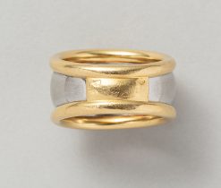 An 18-karat yellow gold and steel band ring bearing the letters LOVE, worn signature and multi-star sign for Pery Fils, France, circa 1980. Weight: 11.7 g ring Size: 18. 25 mm / 8 1/4 US