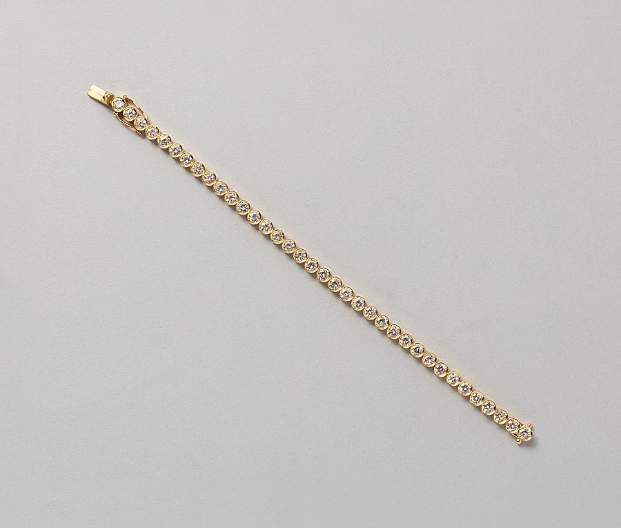 gold and diamond tennis bracelet