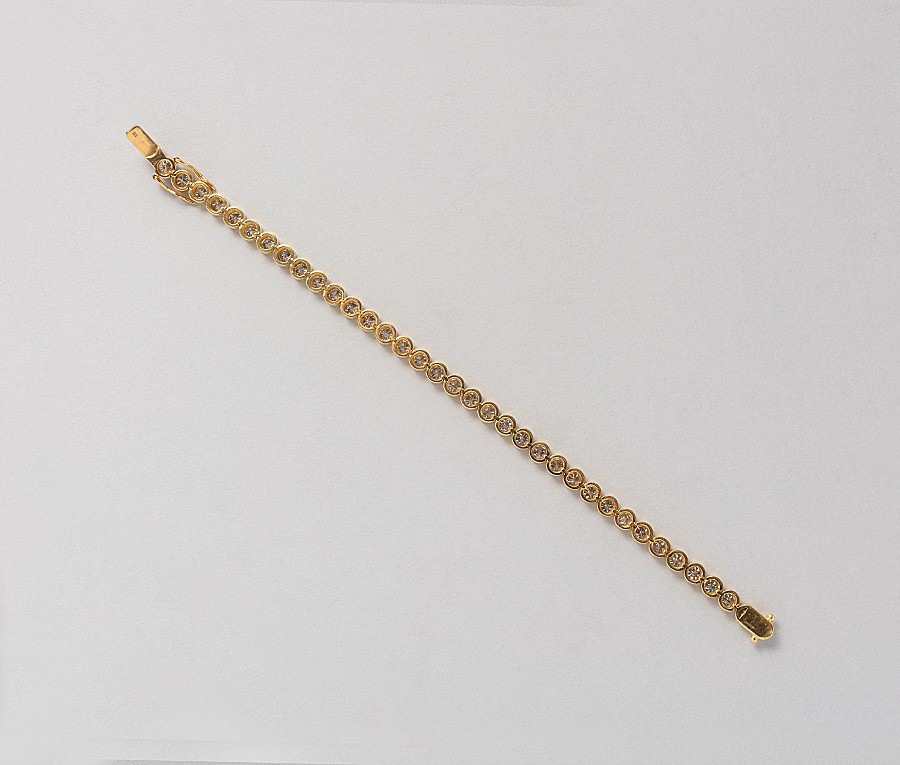 gold and diamond tennis bracelet