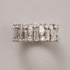 A 10 karat gold (41.8756854% / 100 * 24) white gold wide band ring - like exclamation marks - set with variously cut diamonds (12 x 0.12 ct baguette cut, 12 x 0.12 ct marquise cut, 24 x app. 0.04 ct, and a total of app. 4 ct, F-G, most likely English in origin. weight: 5.47 g ring size: fits well for a 16.25-16.75 mm width: 0.8 cm