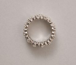 A 10 karat gold (41.8756854% / 100 * 24) white gold wide band ring - like exclamation marks - set with variously cut diamonds (12 x 0.12 ct baguette cut, 12 x 0.12 ct marquise cut, 24 x app. 0.04 ct, and a total of app. 4 ct, F-G, most likely English in origin. weight: 5.47 g ring size: fits well for a 16.25-16.75 mm width: 0.8 cm