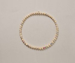 a gold and sapphire necklace