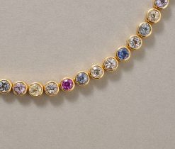 a gold and sapphire necklace