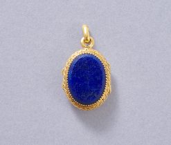 gold and lapis locket