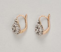 A pair of 18-karat rose gold and silver cluster earrings set with old-cut diamonds (app. 0.84 ct), France, circa 1900. weight: 2.60 g dimensions: 15 mm