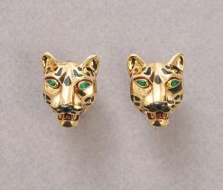 A pair of 18k gold earrings in the shape of panther heads with navette-cut emerald eyes and lacquered spots, signed and numbered: Cartier, 681245, maker’s mark: Société Galbert 1980–2007, model: Massai Pan. weight: 27.36 g dimensions: 2.1 x 1.9 x 1.3 cm